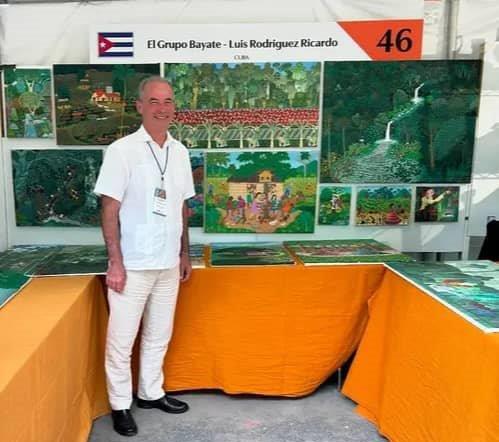 El arte naif cubano regresa a los Estados Unidos (+PodCast) 2 LUIS RODRIGUEZ RICARDO EN EL STAND DEL GRUPO BAYATE. FERIA DE LOS ESTADOS UNIDOS
